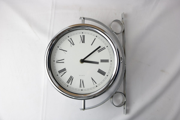 Klok verz. aan wandhouder 38cm